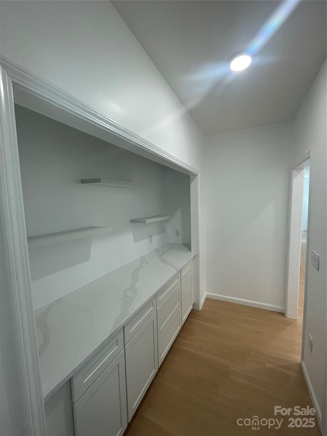 654 Hollybrook Dr, Flat Rock, NC 28731 - hallway with light wood-style floors and baseboards
