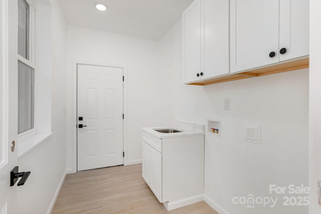 654 Hollybrook Dr, Flat Rock, NC 28731 - laundry area with washer hookup, light wood-type flooring, cabinet space, and recessed lighting