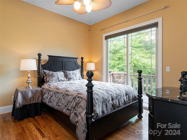 bedroom featuring wood-type flooring, ceiling fan, and access to exterior