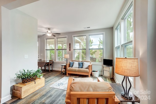 living room with hardwood / wood-style floors and ceiling fan