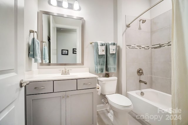 full bathroom with vanity, toilet, and shower / bath combo