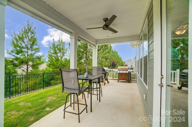 view of patio featuring ceiling fan