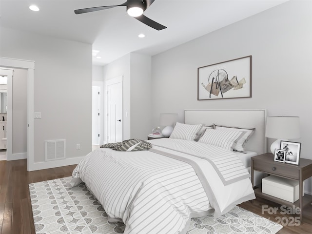 bedroom with baseboards, visible vents, a ceiling fan, wood finished floors, and recessed lighting