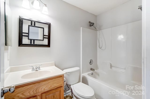 full bathroom featuring vanity, shower / bath combination, and toilet