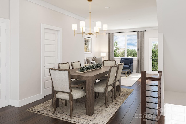 dining area with ornamental molding, dark hardwood / wood-style flooring, and a notable chandelier