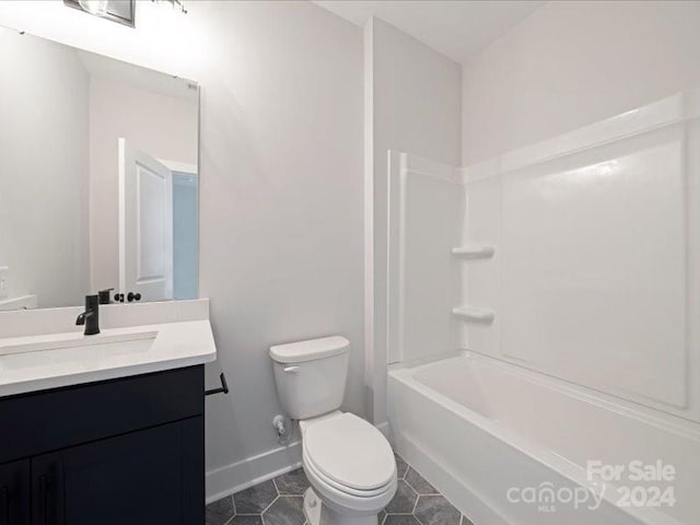 full bathroom featuring tile patterned flooring, vanity, toilet, and shower / tub combination