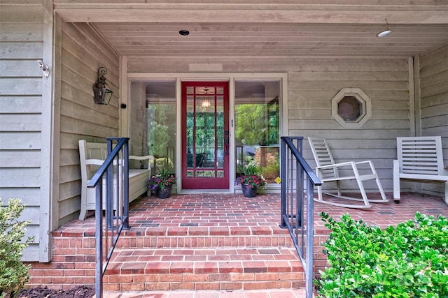 doorway to property featuring a porch