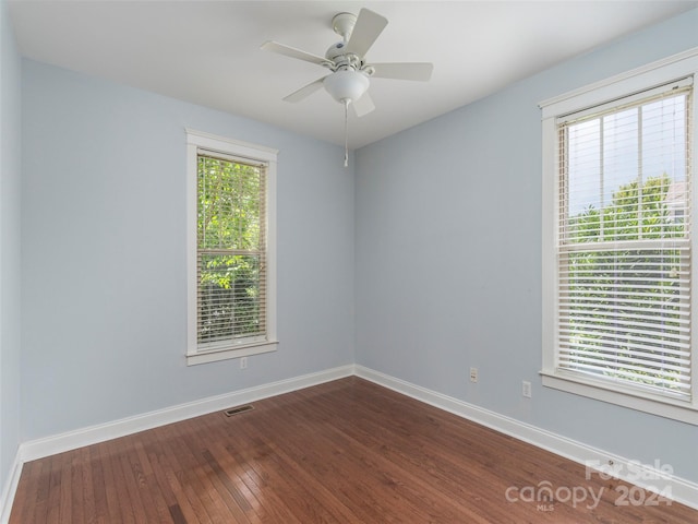 spare room featuring ceiling fan and wood-type flooring