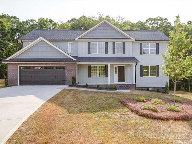 1133 Heather Oak Ln, Oakboro, NC 28129 - view of front of home featuring a porch, driveway, a garage, a front lawn, and a shingled roof