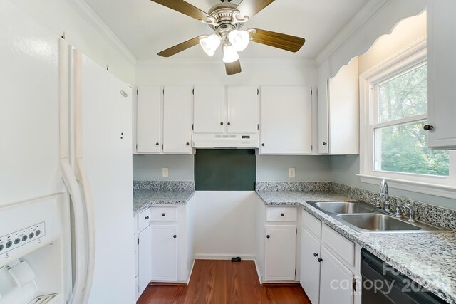 kitchen featuring sink, white cabinetry, dark wood-type flooring, white fridge, and ceiling fan