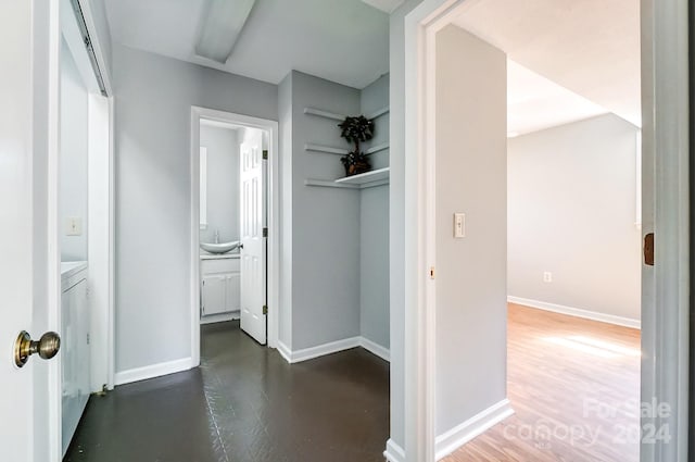 hallway featuring dark hardwood / wood-style floors