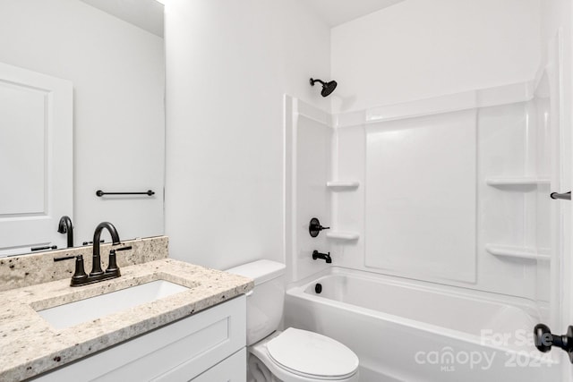 full bathroom featuring vanity, bathtub / shower combination, and toilet