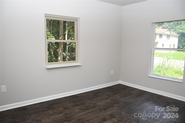 spare room featuring hardwood / wood-style flooring