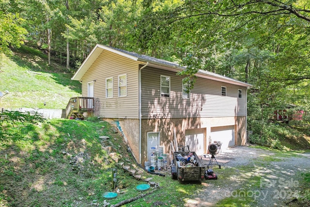 view of home's exterior with a garage