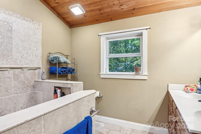 bathroom with lofted ceiling, wood ceiling, and vanity