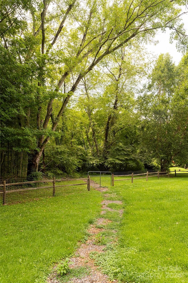 surrounding community featuring a lawn