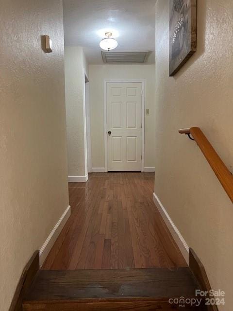 hallway featuring hardwood / wood-style flooring