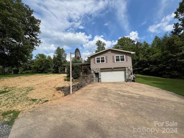 view of property exterior with a garage