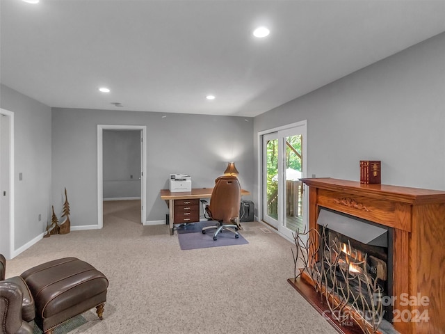 home office with carpet flooring