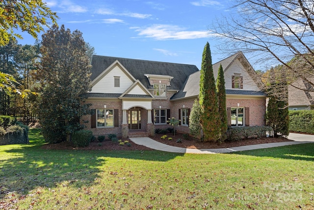 view of front of home with a front yard