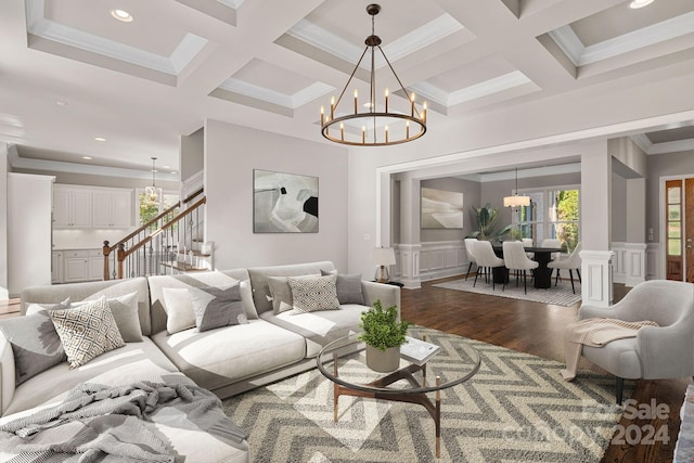 living room with beam ceiling, dark hardwood / wood-style floors, crown molding, and coffered ceiling