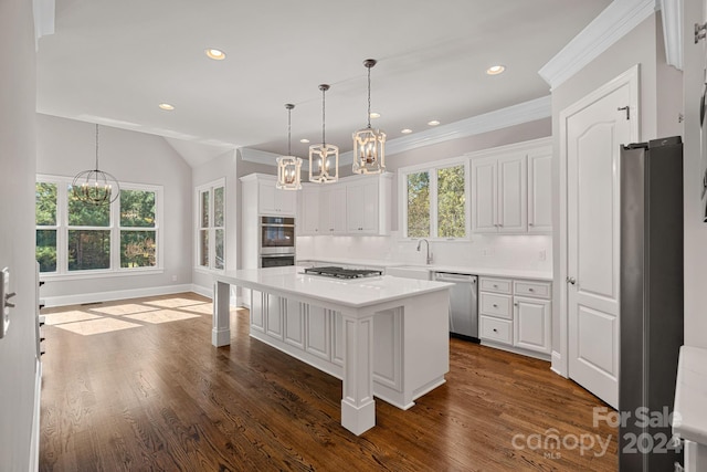 kitchen featuring a center island, dark hardwood / wood-style flooring, white cabinetry, and appliances with stainless steel finishes