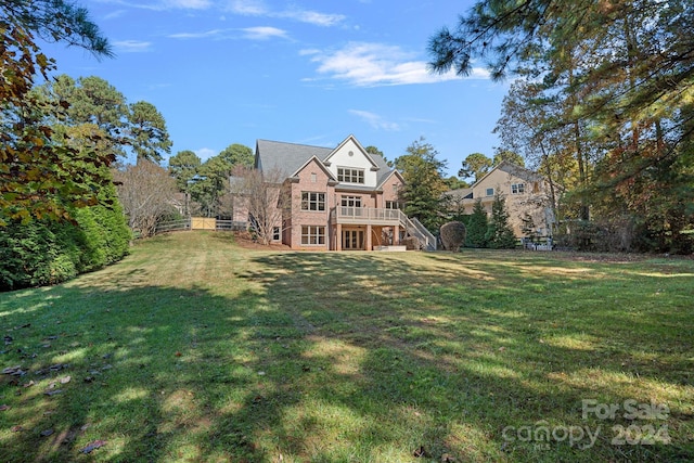 exterior space with a lawn and a deck