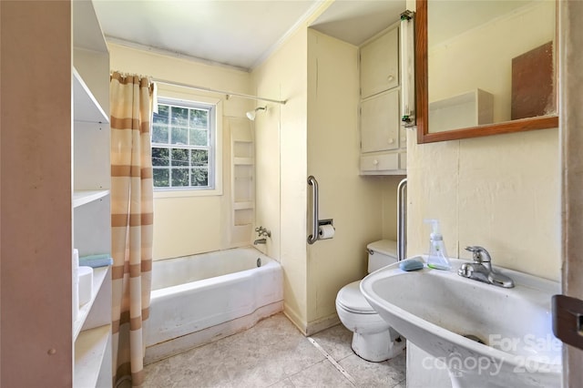 full bathroom with toilet, sink, and shower / bath combo with shower curtain