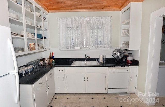 kitchen featuring light tile patterned flooring, white appliances, sink, and wooden ceiling