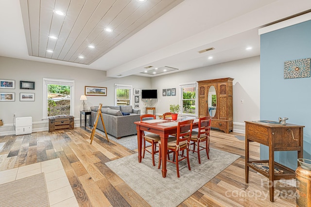 dining space with light wood finished floors, visible vents, recessed lighting, and baseboards