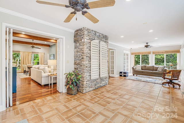 living room with light tile patterned flooring, recessed lighting, and ornamental molding