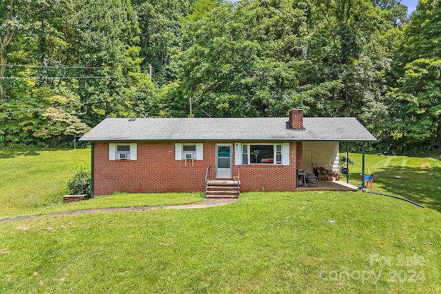 single story home featuring a patio and a front yard