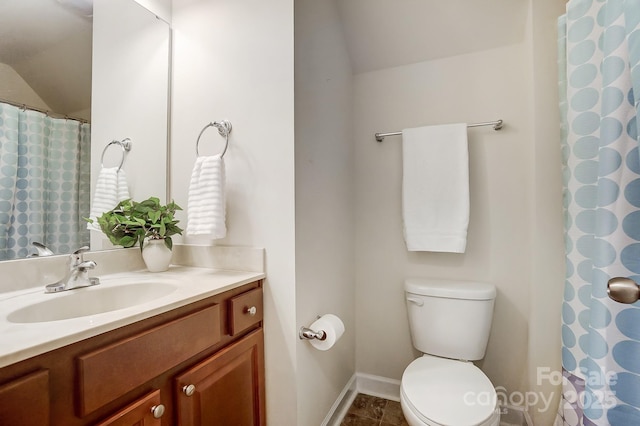 full bath featuring toilet, baseboards, and vanity