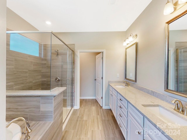7025 Stella Pl, Stanley, NC 28164 - bathroom with double vanity and a shower stall