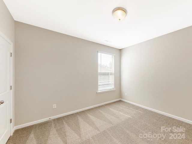 7025 Stella Pl, Stanley, NC 28164 - spare room with light colored carpet and baseboards