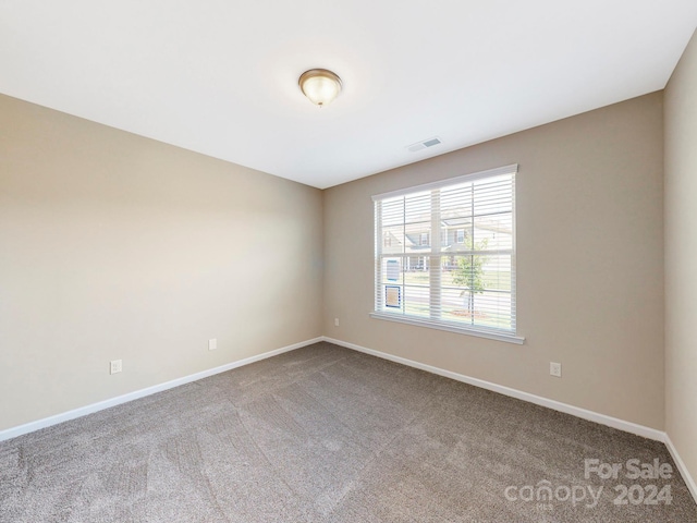 7025 Stella Pl, Stanley, NC 28164 - spare room featuring carpet floors