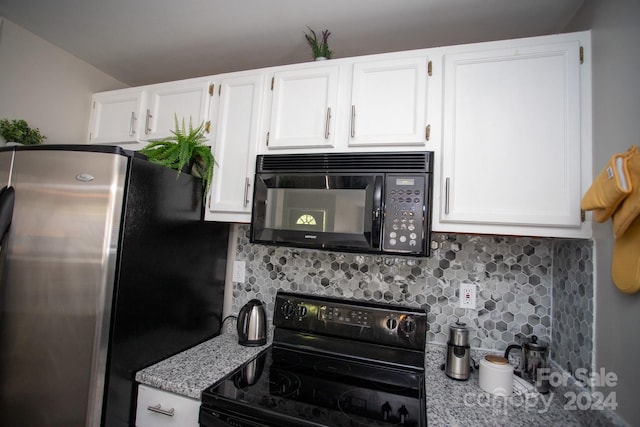 kitchen with white cabinetry, black appliances, and decorative backsplash