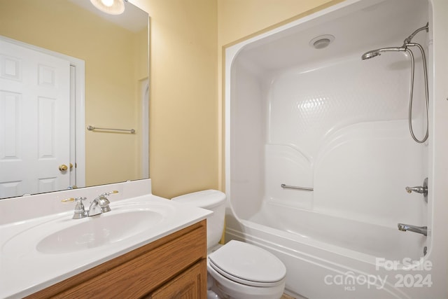 full bath with tub / shower combination, vanity, and toilet