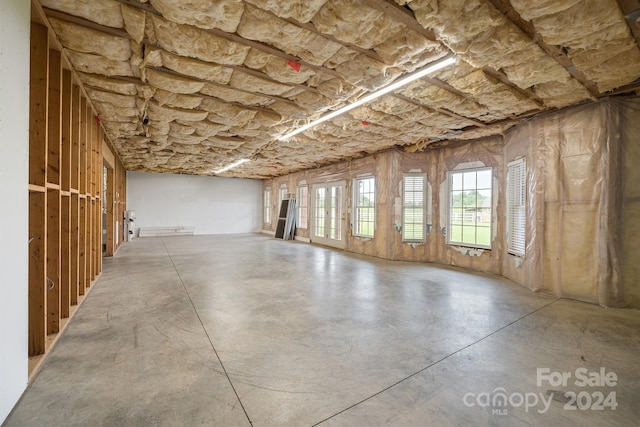 misc room with finished concrete flooring