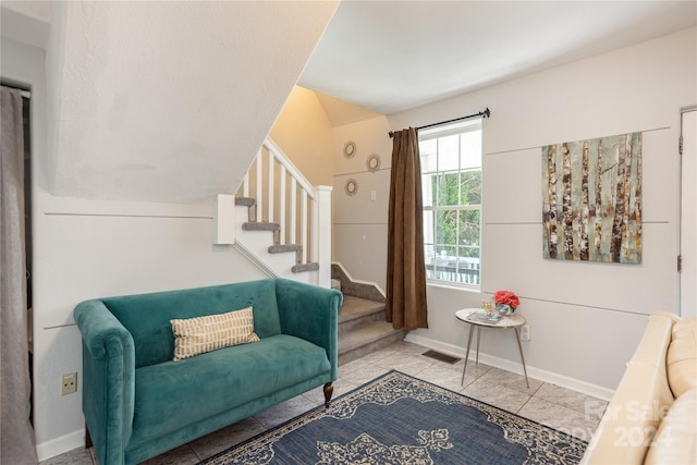 sitting room featuring light tile patterned flooring