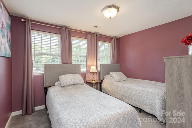 bedroom featuring carpet