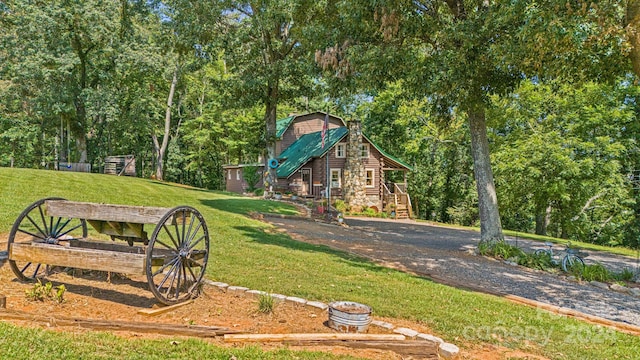 surrounding community featuring a yard