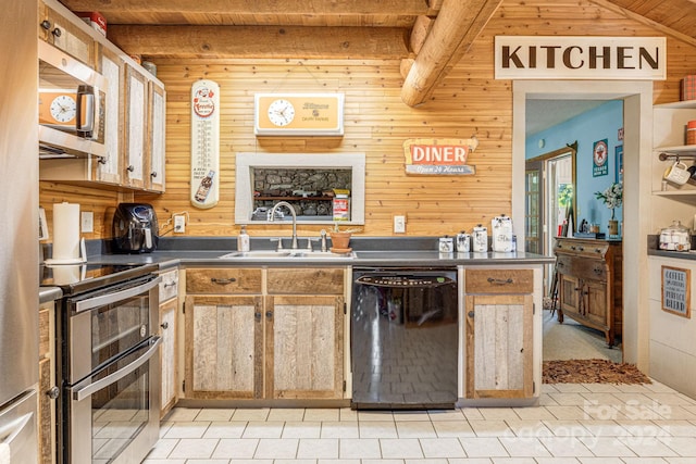 kitchen with wood ceiling, wood walls, stainless steel appliances, and sink