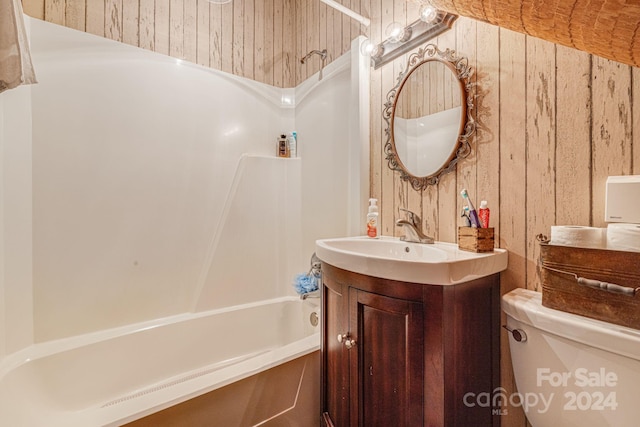 full bathroom featuring vanity, toilet, and tub / shower combination