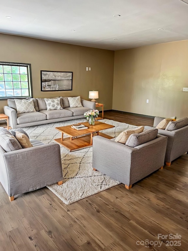 living room with wood finished floors