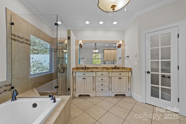 bathroom featuring ornamental molding, tile patterned flooring, separate shower and tub, and vanity