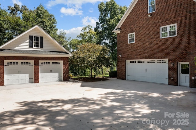 view of property exterior with a garage