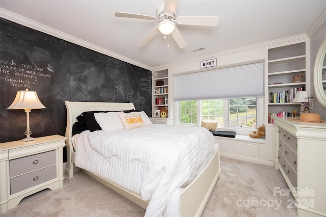 bedroom featuring ceiling fan, light colored carpet, and ornamental molding