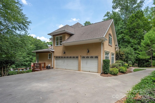 view of home's exterior with a garage