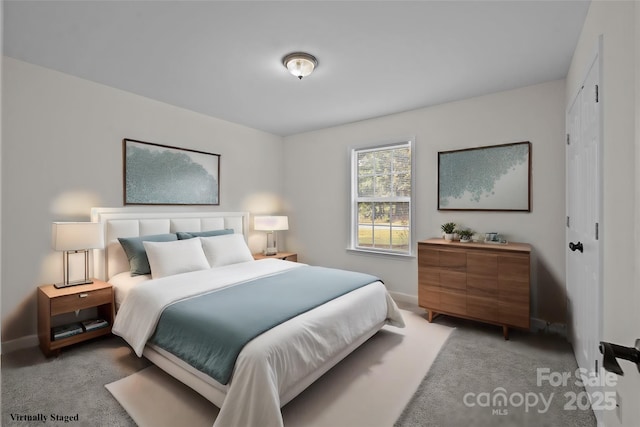 bedroom featuring light colored carpet